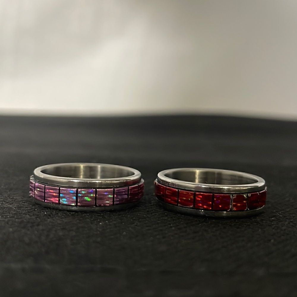 Two beautiful ring with reflective colors in them